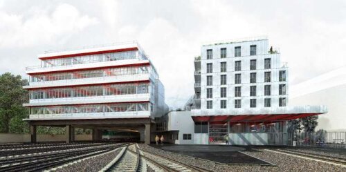 e futur atelier de maintenance des équipements électroniques de la RATP (à gauche) et les 400 logements sociaux (à droite), vus depuis les voies d’entretien du métro. 
